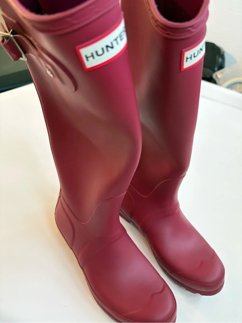 Gently used Women’s Hunter rainboots size 7 raspberry color